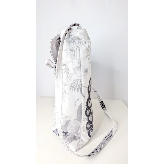 Slouchy parcel bag, peacock eyespots dance