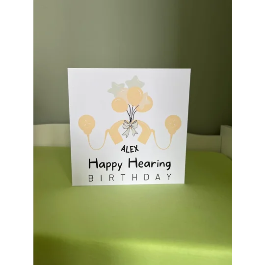 Happy Hearing Birthday Card: Cochlear Implant & Hearing Aid