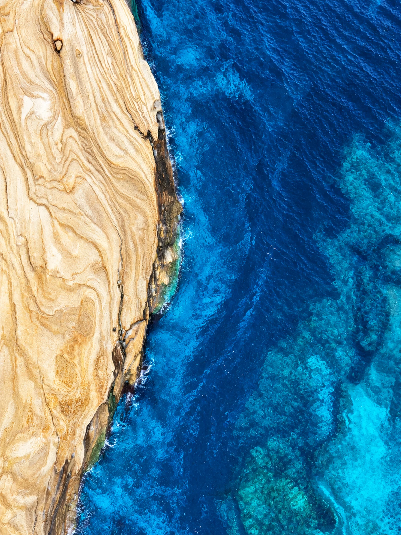 Aerialsandstonecoastlineandblueocean 1792329723431