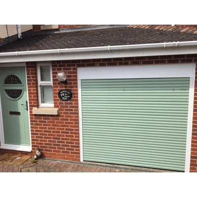Insulated electric roller garage door