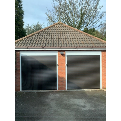 Insulated electric roller garage door