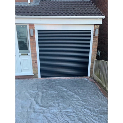 Insulated electric roller garage door