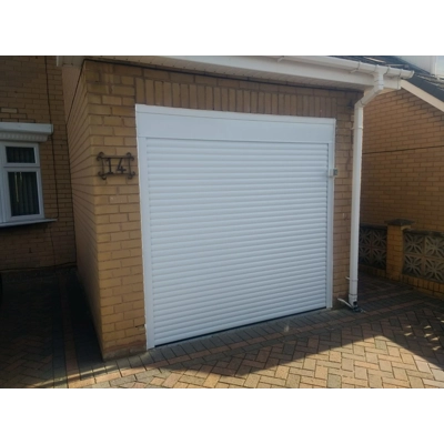 Insulated electric roller garage door