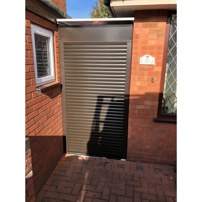 Insulated electric roller garage door