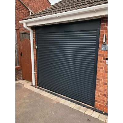 Insulated electric roller garage door
