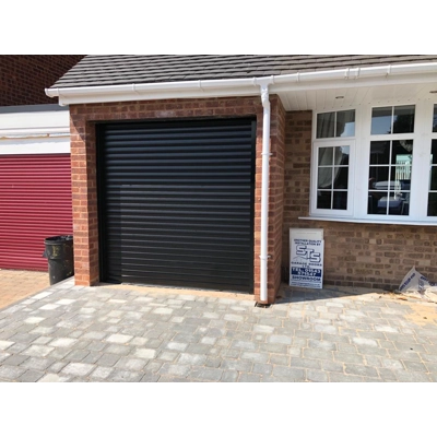 Insulated electric roller garage door
