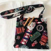 Cross Body Peg Bag, casino fabric lined over shoulder peg bag
