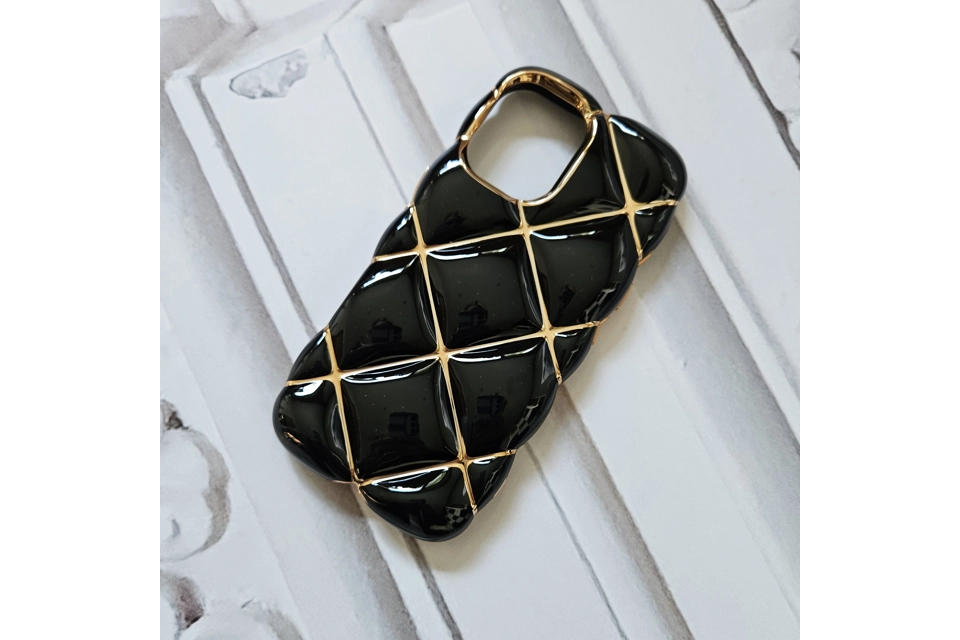 Black and gold quilted phone case