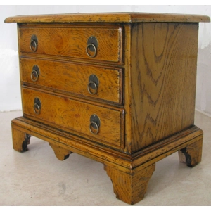 A Queen Anne period antique oak chest of drawers