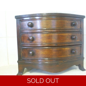 Bow front chest in mahogany