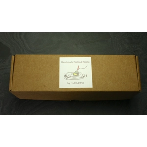 Canvas float roll with handmade floats in a cardboard box