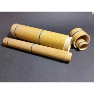 Traditional bamboo float tube with whipping bands for storing handmade floats.