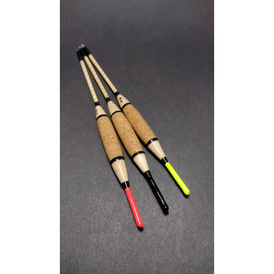Three handmade Signature Avon fishing floats with red, black and yellow sight tips