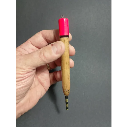 carp surface controller float with hand for scale
