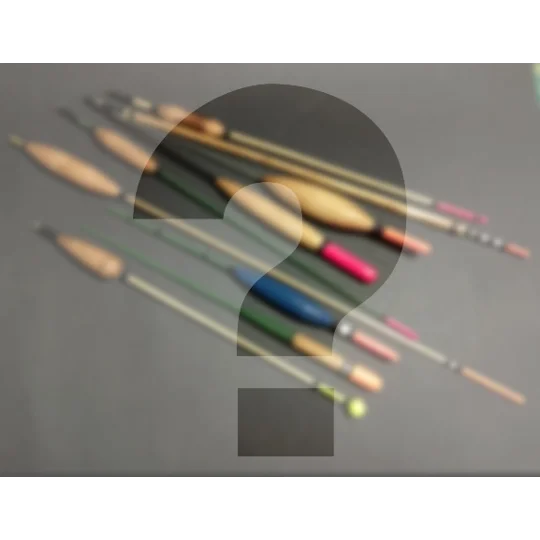 Selection of handmade fishing floats in classic still-water or river styles forming an artisan float maker’s mystery box set.