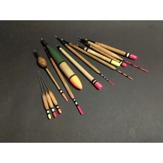 Mixed set of handmade river and lake fishing floats showing variety included in a traditional mystery float box