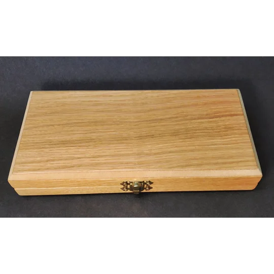 A plain, non personalised wooden fishing float box made from oak to fit sixteen floats inside.