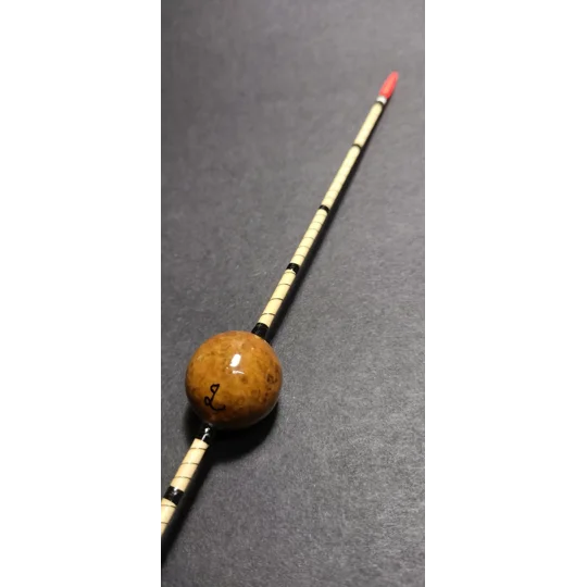 detail photo of oak gall waggler float on black background