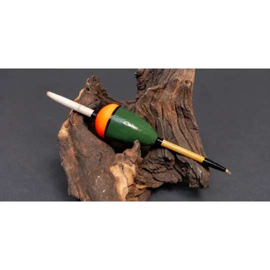 cork and quill pike gazette style pike bung on log