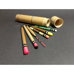 set of six handmade fishing floats in a bamboo tube with whipped decoration