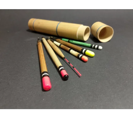 Set of six small floats in a whipped bamboo tube