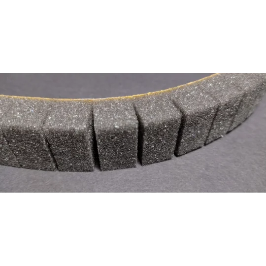 detail of precision cut slots for floats in the float foam strips before putting in a tackle box