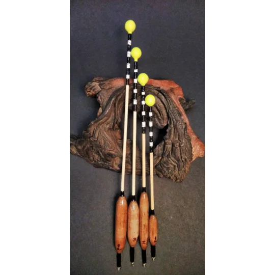 Traditional handmade tench floats designed for classic lift method fishing