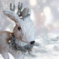 White and silver straw reindeer