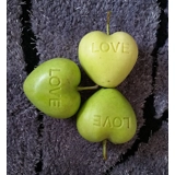 Heart shaped apple with love were made..