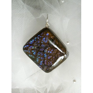 Silver Wire Wrapped Alberta Ammolite Blue Pendant