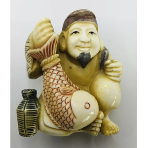 Netsuke - Man Holding Fish