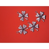 SILVER COLOURED FOUR LEAF CLOVER ..