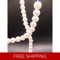 24 x Ivory Coloured Glass Pearls ..