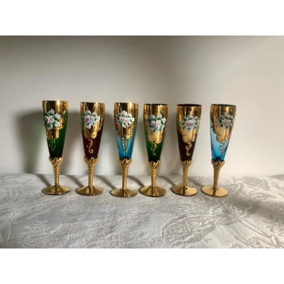 Murano glass champagne flutes with gold gilding hand painted enamel floral relief designs on twisted