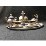 A wonderful porcelain tête-à-tête "Marquise de Sevigne", entirely hand-painted, produced by the Goum