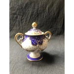 A wonderful porcelain tête-à-tête "Marquise de Sevigne", entirely hand-painted, produced by the Goum