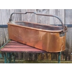 Vintage French Poissonnière large copper fish kettle with iron swing handle.