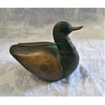 Handmade carved wooden duck painted green with copper trim