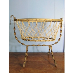 Antique French wrought iron and cotton mesh doll cradle.C1..