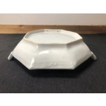 A hand painted ceramic dish with two handles