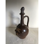 Vintage French stoneware Calvados jug with a carved stopper depicting a male face, France vintage storage bottle