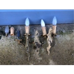 A trio of fine old French wall sconces lamps in a mix of brass/cast bronze in a rococo style: one two-lamp and two single-lamp wall sconces