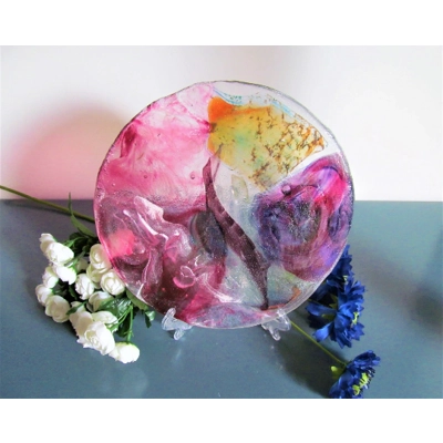 A lovely unique unusual handmade fused glass plate with stunning random colours, wall decor, window table ware interior or exterior
