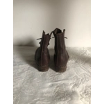 Old pair of children's leather ankle boots with wooden soles, antique school clogs, ap.1920s