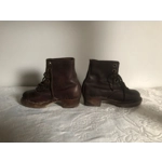 Old pair of children's leather ankle boots with wooden soles, antique school clogs, ap.1920s
