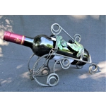 French traditional vintage metal wine bottle holder decorated with a green grape leaf.