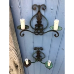 A pair of two-arm early 20th century French wrought iron and tole wall lights wall sconces of Classic design,worn green patina green France