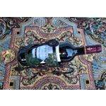 French traditional vintage metal wine bottle holder decorated with a green grape leaf.