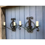 A pair of two-arm early 20th century French wrought iron and tole wall lights wall sconces of Classic design,worn green patina green France