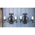 A pair of two-arm early 20th century French wrought iron and tole wall lights wall sconces of Classic design,worn green patina green France